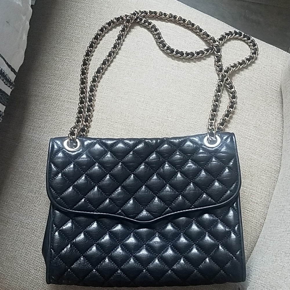 Crossbody leather bag with gold hardware